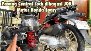 The Honda Spacy FI features an automatic trunk opener and central lock.