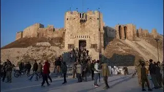 Syrian troops withdraw from Aleppo as rebels advance.