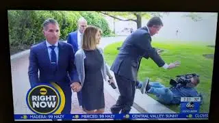 Cameraman trips and falls