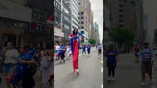 Puerto Rican day ( Girl Dancing On stilt )