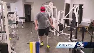 Officer Tyler Franks walks for the first time since losing his leg