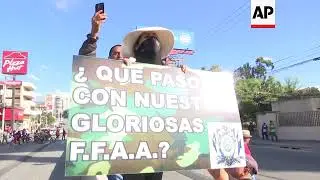 Protesters clash with police in Honduras as president sworn in