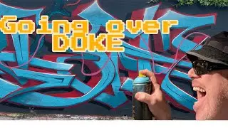 Going over DOKE (graffiti)
