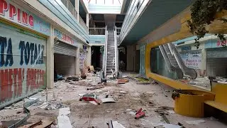 Esploriamo un centro commerciale nella completa devastazione