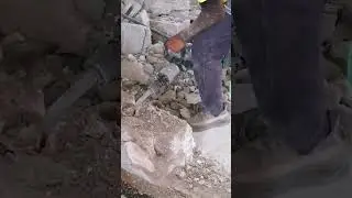 concrete blocks demolition works using  jack hammer.