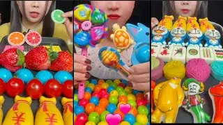 ASMR eating colorful toy candy, strawberry, doraemon and magical chew candy 🍭🎊