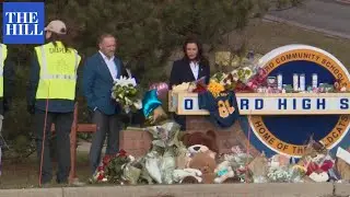 Michigan Gov. Whitmer Drops Off Flowers At Memorial For Oxford HS Shooting Victims