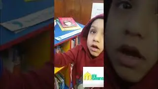 exploring books at Library #minimomins #shorts #youtubeshorts
