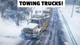 Trying to tow new Freightliner FLD 120 & WS DLC while carrying double logging trailer, and IT WORKS!