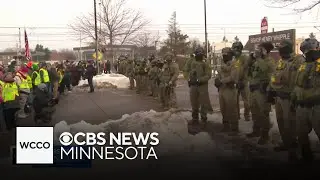 Tensions high outside Minneapolis federal building after fatal ICE shooting