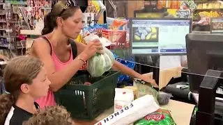 US economy shrinks for a 2nd quarter, raising recession fear