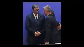 Serbia's Aleksandar Vucic and Kosovo's Hashim Thaci Shake Hands