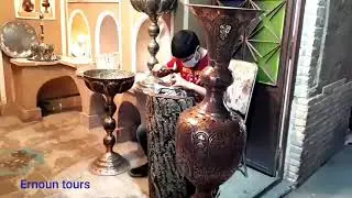 Metalworking students that are learning  Persian traditional art in Yazd city