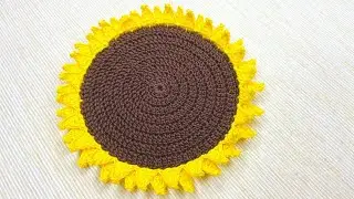 Video review of crocheting a sunflower doily.