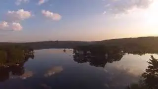 Aerial Drone Video of Mirror Reflection on Lake Maspenock Hopkinton MA