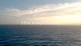 cruise ship on the horizon in good weath...