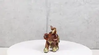Feng Shui Faux Wood Left Facing Trunk Up Elephant With Golden Tapestry Figurine