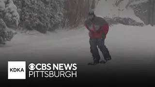 Pittsburghers enjoy the heavy snowfall blanketing western Pennsylvania