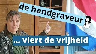 De Handgraveur viert de vrijheid.