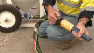 Using cable ties to secure deadman control line and handle