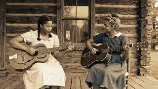 Two Guitars Facing Each Other Acoustic Blues as Shared Language