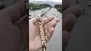 Cuban style two tone stainless steel bracelet.