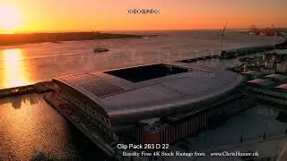 Hill Dickinson Stadium Drone Stock Footage: Sunset with Wind Turbines