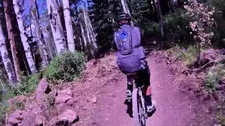 MOUNTAIN BIKING ALPINE FUNNEL SNOWMASS COLORADO FREE RIDE TRAIL DURING BLAST THE MASS