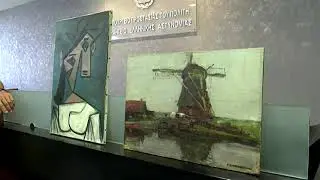 Stolen Picasso painting recovered by police drops on floor