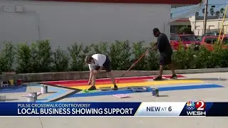 Orlando business paints rainbow flag in support of crosswalk near Pulse