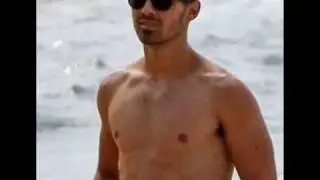 Joe Jonas on the beach piks! No Shirt No Shoes Burning up! HOT!.wmv