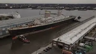 Footage of the S.S. United States ocean liner leaving Philadelphia.