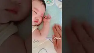 Cool Baby Laughing And Sleeping On A Cozy Baby Sheet - So Adorable!