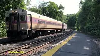 MBTA #1650 with #1074 trailing flies through Belmont Center, MA