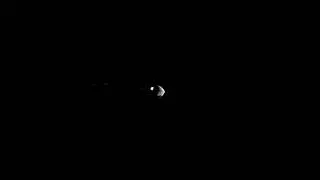 Mars orbiter takes a stunning shot of Martian moon with Jupiter