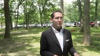 HE WENT HIKING IN A SUIT!