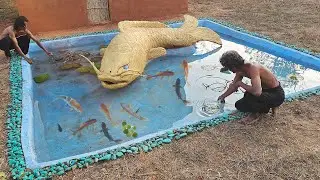 Digging a fish pond with beautiful fish statues in the forest