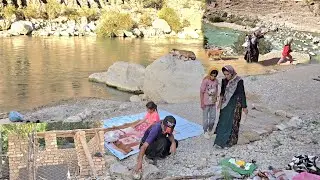 Mola nomadic family life and preparation for the river by the mountains