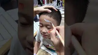 🎨✨ Koi Fish Face Paint on the cutest little artist! 🐟💖