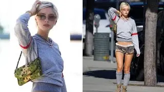 Iris Law displays her model figure in microscopic hotpants and a cropped sweater as she runs errands