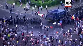 Water canon deployed during clashes at Romanian protest rally