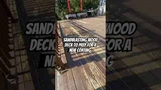 Sandblasting wood deck to remove paint and years of weather damage.