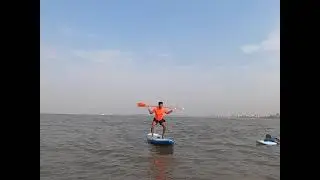 squat on SUP in the middle of Arabian sea