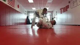 Triangle from Spider Guard- Opponent standing.