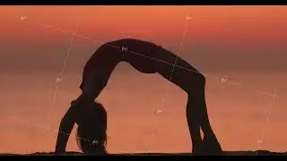 Silhouette of Woman in One-Legged Bridge Pose on Beach at Sunset
