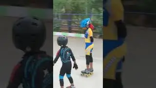 Saanvi & Sanshray discussing strategies in the skating rink