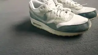 Girl selling her old Nike Air Max one's