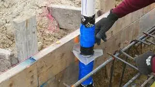 Installation of a four-inch Termistop stainless steel termite barrier