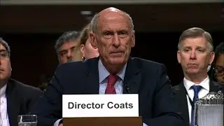 US intel chief mum on possible Trump pressure on Russia probe