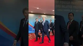 Russian FM Sergey Lavrov reacts with surprise as the media recognise him